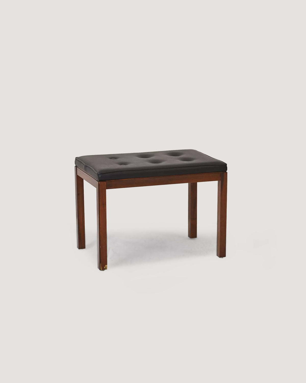 Pouf vintage in palissandro con seduta in ecopelle