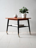 Coffee table scandinavo vintage in teak con rotelle