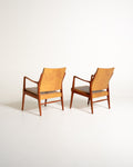 Coppia di poltroncine scandinave in similpelle, anni ’60
