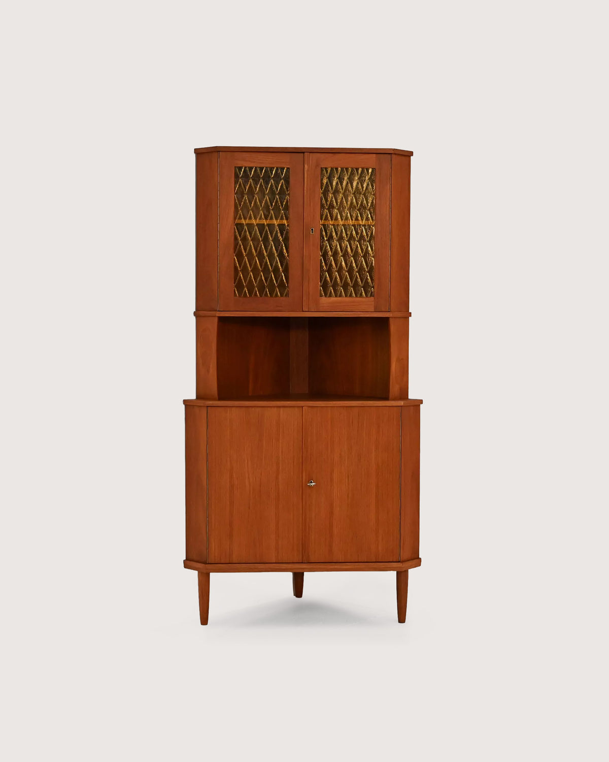 Angoliera scandinava mid-century in teak, anni ’50