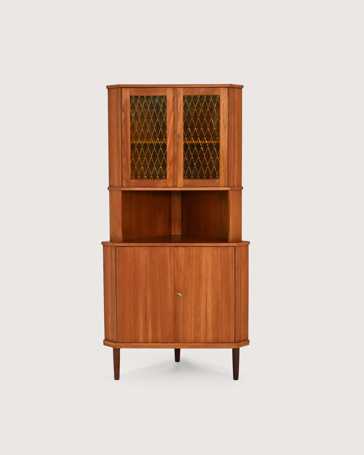 Angoliera scandinava mid-century in teak, anni ’50