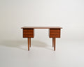 Scrivania scandinava in teak con sei cassetti, anni '60