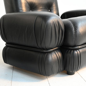Poltrone in pelle nera e acciaio tubolare anni ’70 9