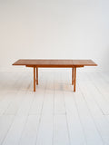 Tavolo scandinavo allungabile in teak e rovere anni ’60 1